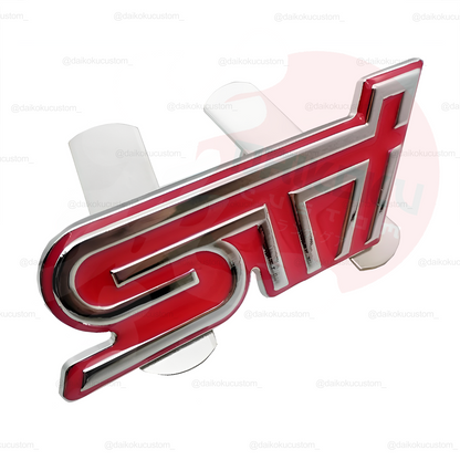 Emblema Apernado Frontal STI